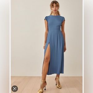 Reformation Gavin Dress Size 8. Worn once. Dress is light blue.